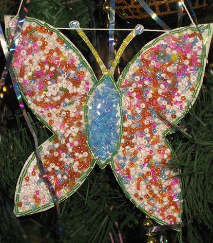 Новогодняя бабочка - аппликация из бисера